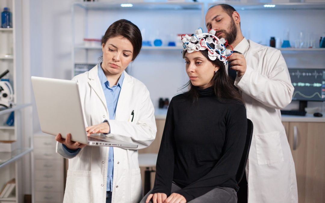 Doctors and neurosurgeons at Saleem Memorial Hospital, Lahore, examining patients with advanced neurological equipment
